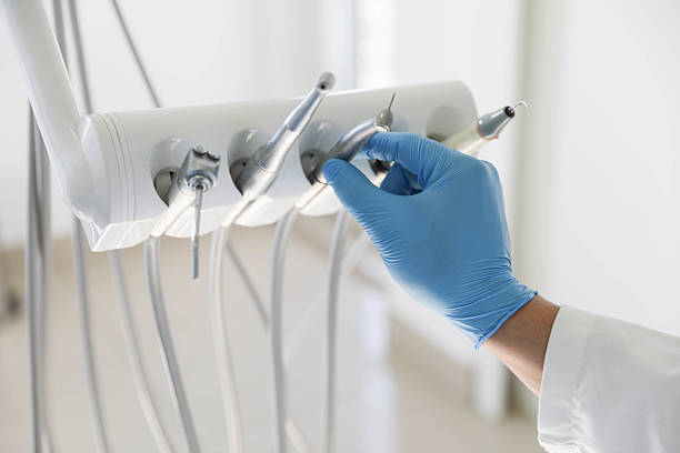 Professional Tooth Extraction technician working in Dranesville, VA